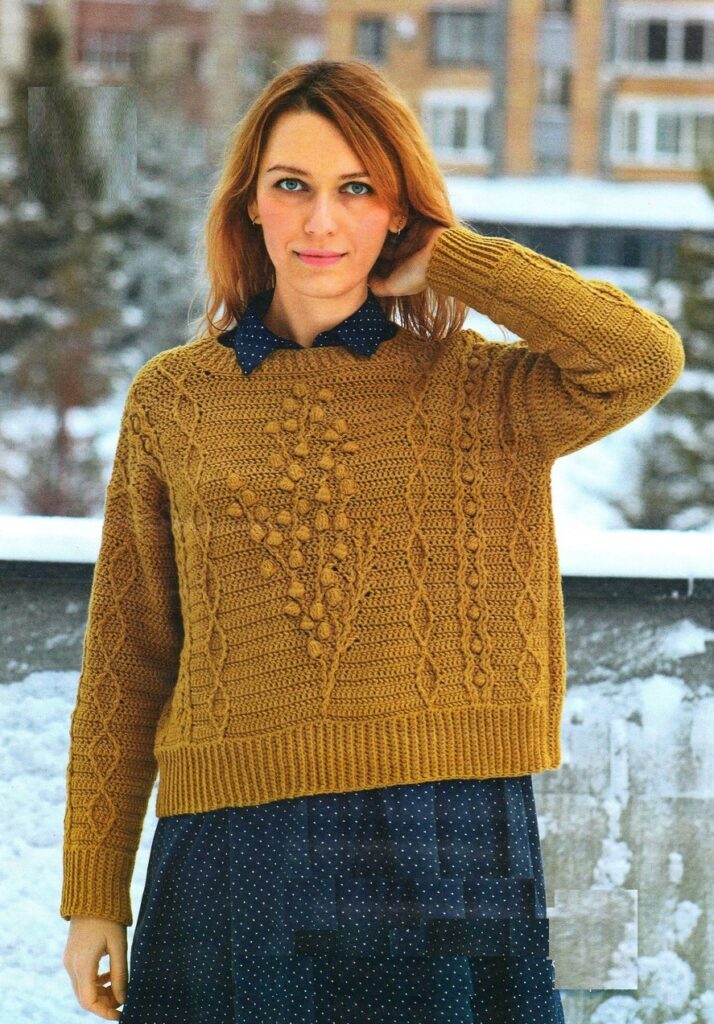 Объемный пуловер с плетеным узором