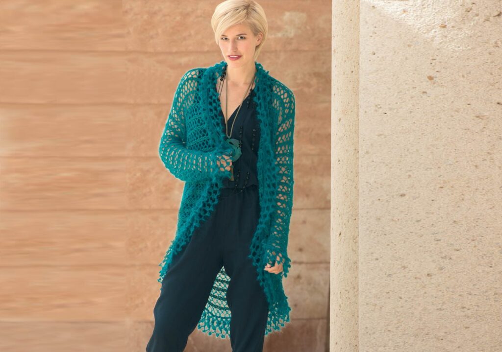 Openwork cardigan with flounce