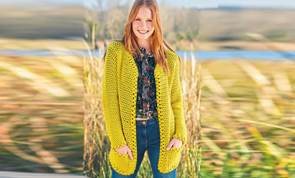 Yellow cardigan with openwork pattern