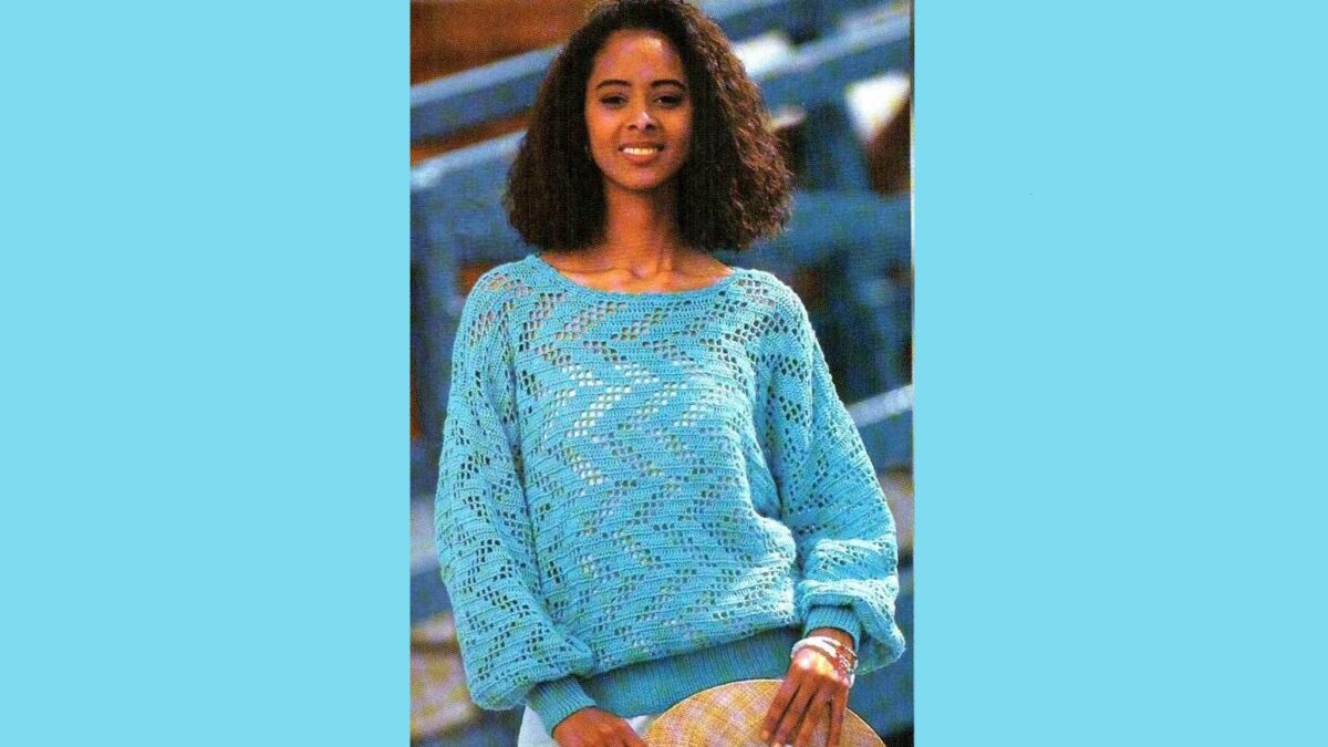 Turquoise pullover with zigzag pattern