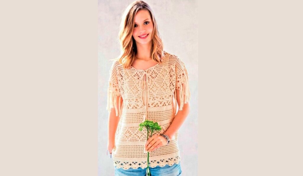 Beige pullover with a mix of patterns