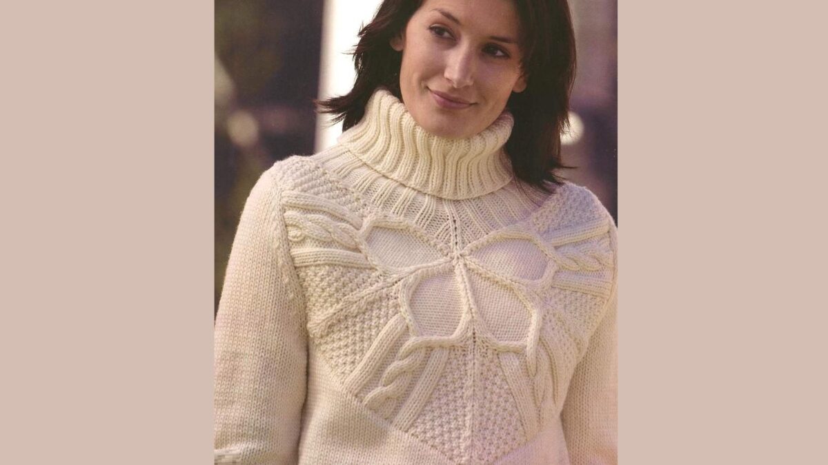 Knitted pullover with butterfly.