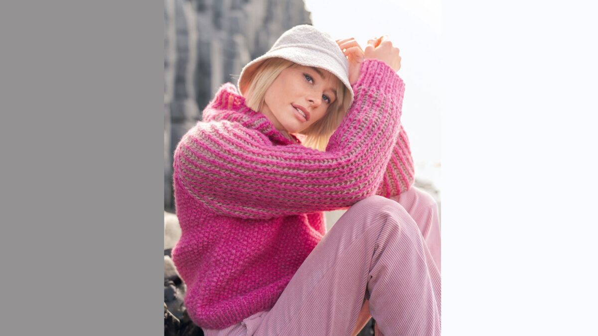 Ярко-розовый пуловер патентным узором