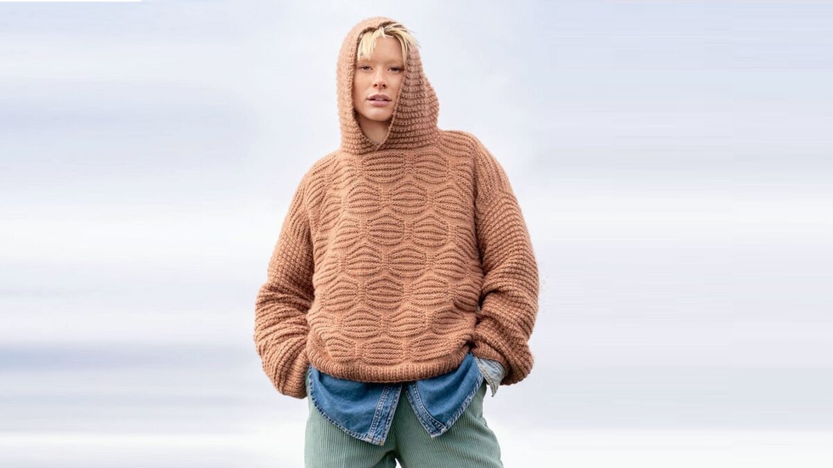 Pullover with hood and pattern with removed loops