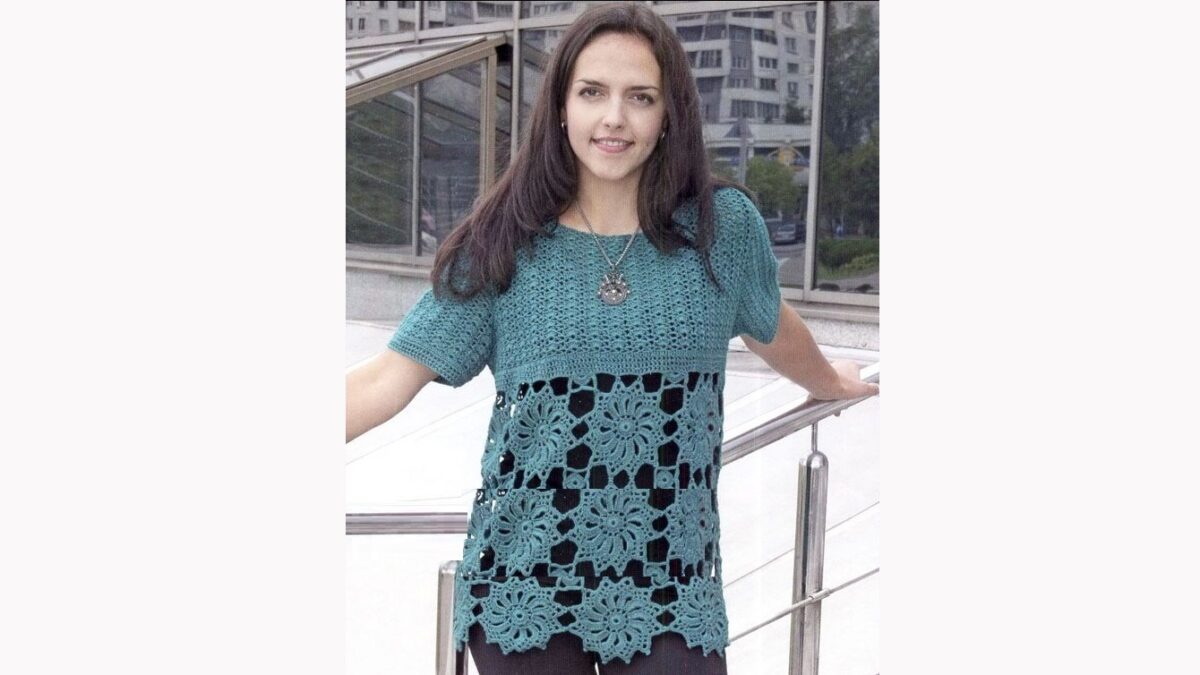 Emerald blouse with filigree motifs