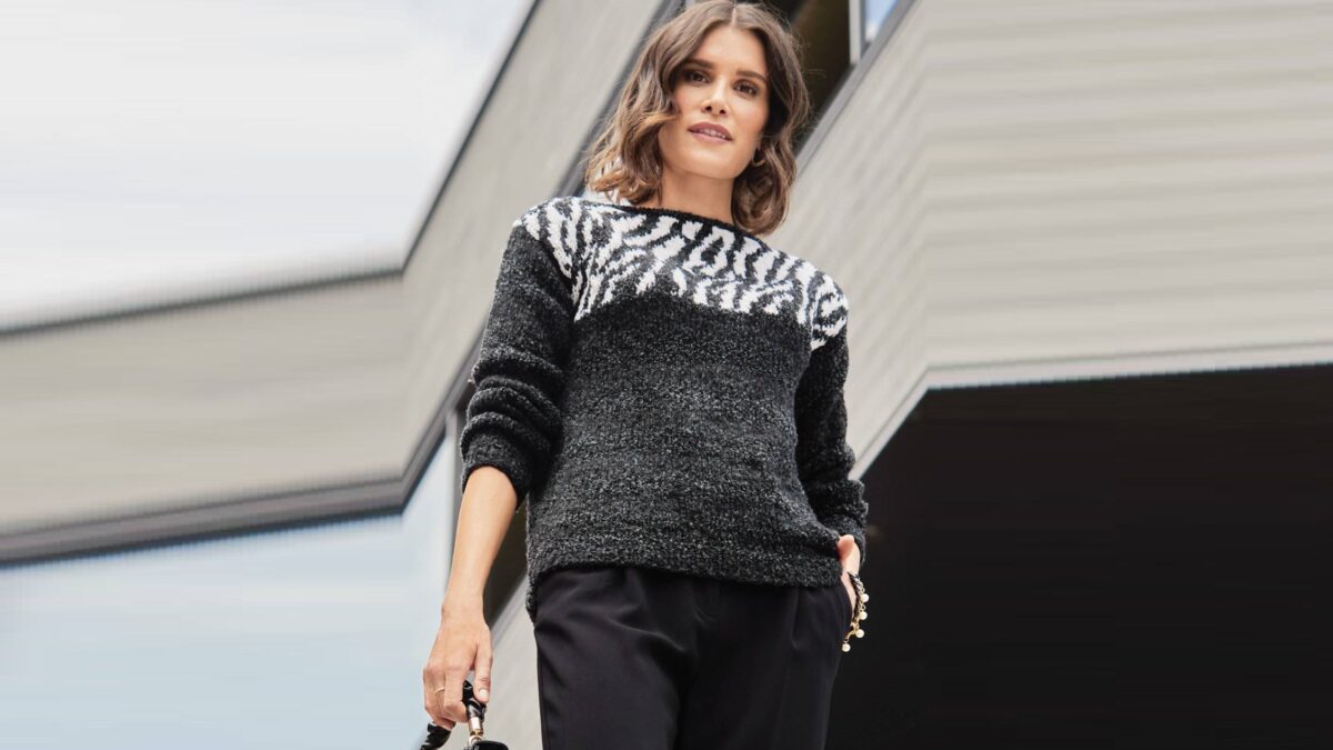 Black and white pullover with jacquard pattern.