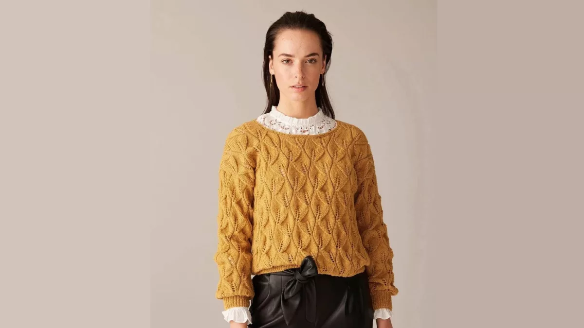 Dark yellow jumper with leaves