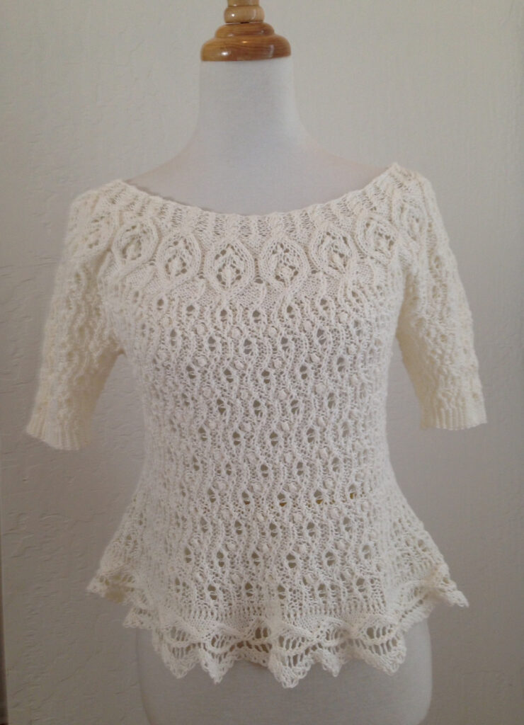 вязаный пуловер